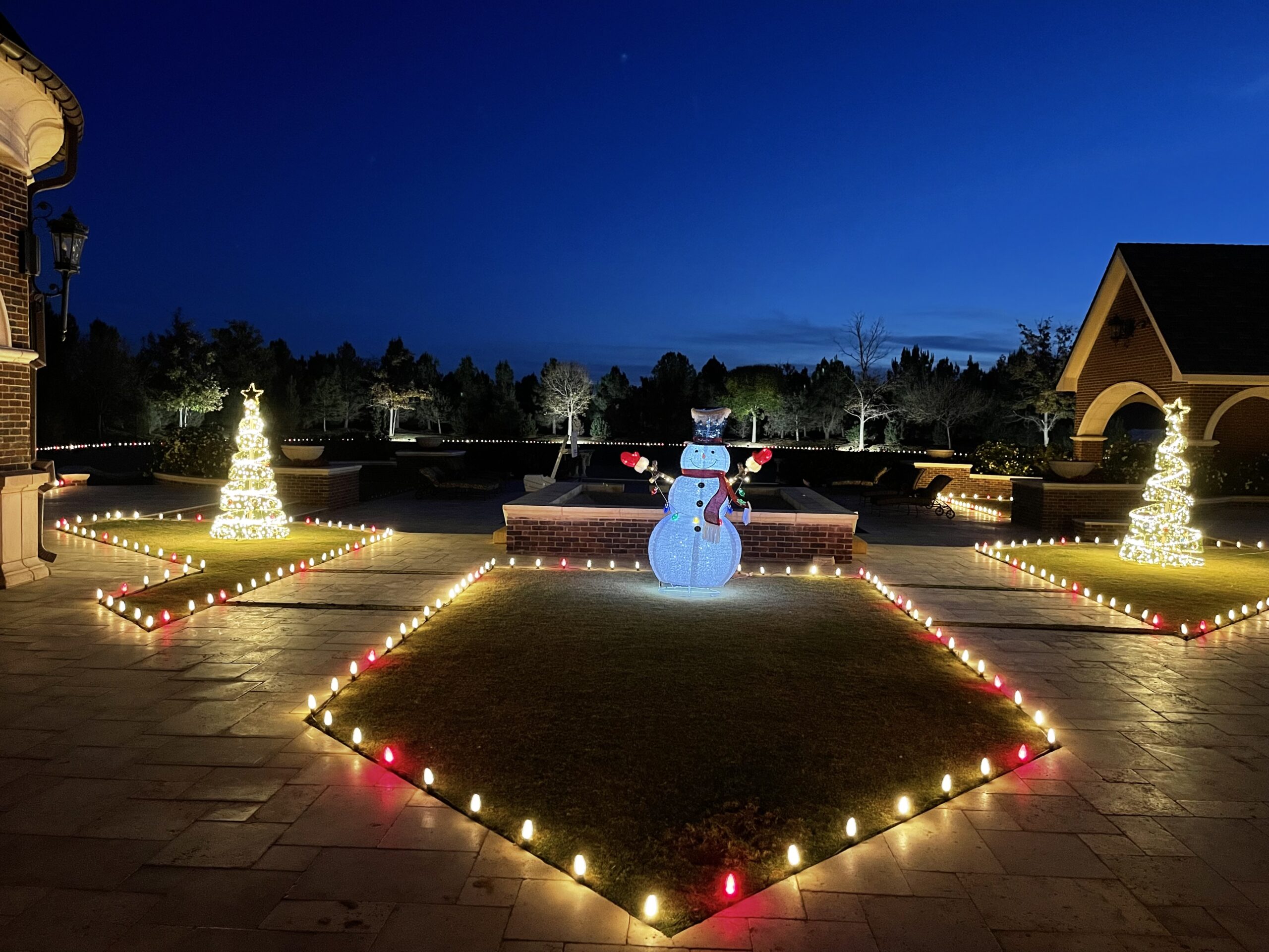 Holiday lighting with snow man.